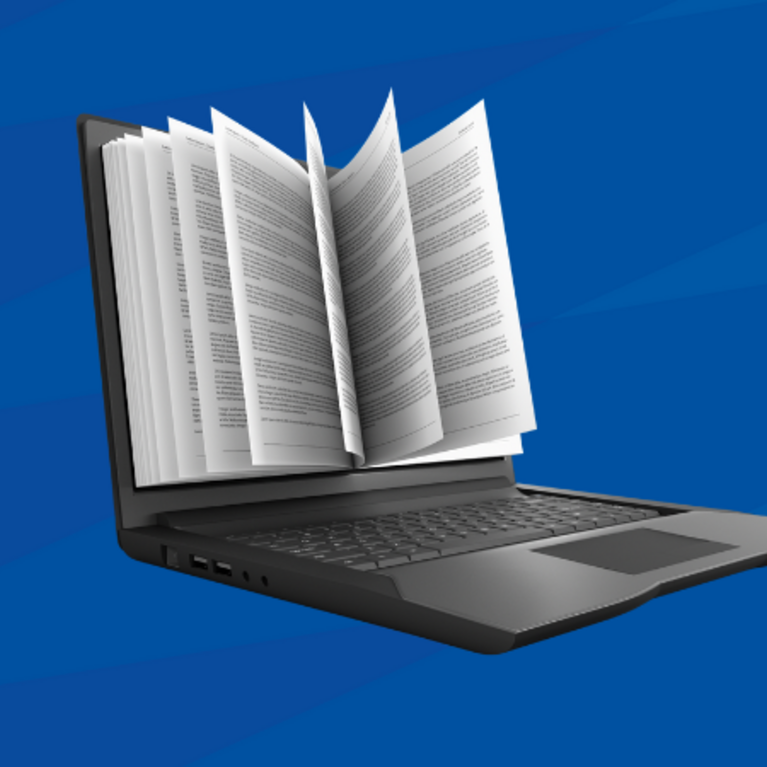 Image of laptop with book inside