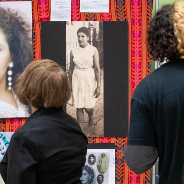 Image of two people viewing an exhibit