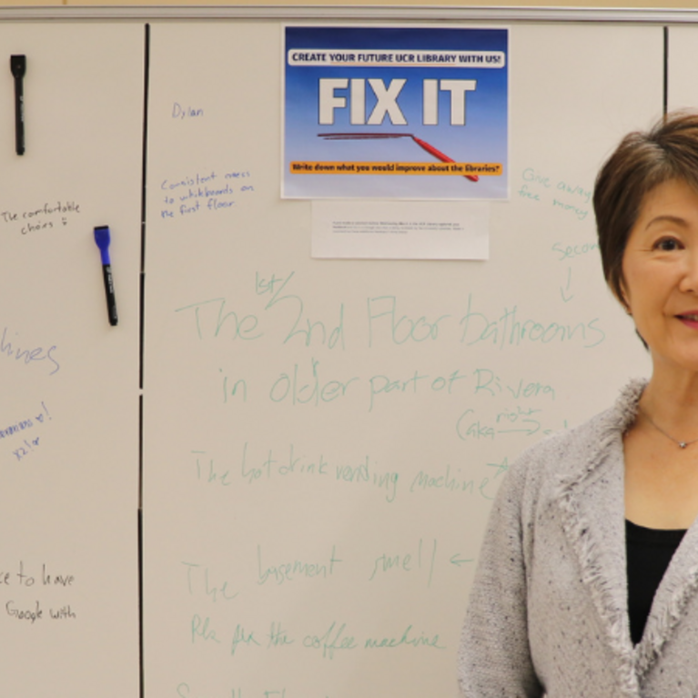 University Librarian Mihoko Hosoi standing inside Rivera Library, representing the leadership team working to address student feedback from the Winter 2026 "Add It, Fix It, Love It" campaign.