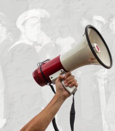 HIST 197 Image of protest in background and bullhorn