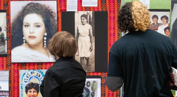 Image of two people viewing an exhibit