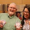 Steve poses with UCR Library's Nicole Valencia at the photo backdrop at his celebration in Orbach Library.