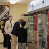 Congressman Shomari Figures, Mihoko Hosoi, and Andrew Lippert at the Tuskegee exhibit.